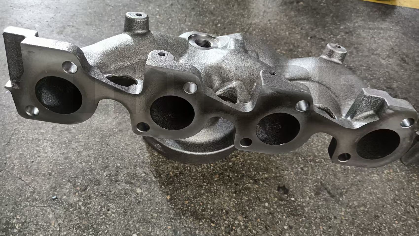 Quais são as vantagens de fundir coletores de escapamento?